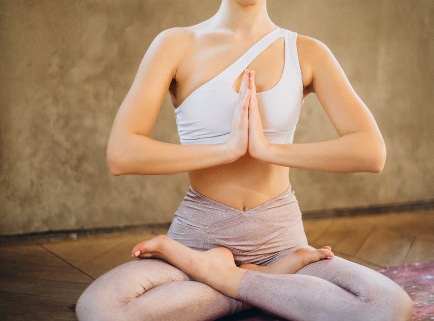 woman practicing yoga